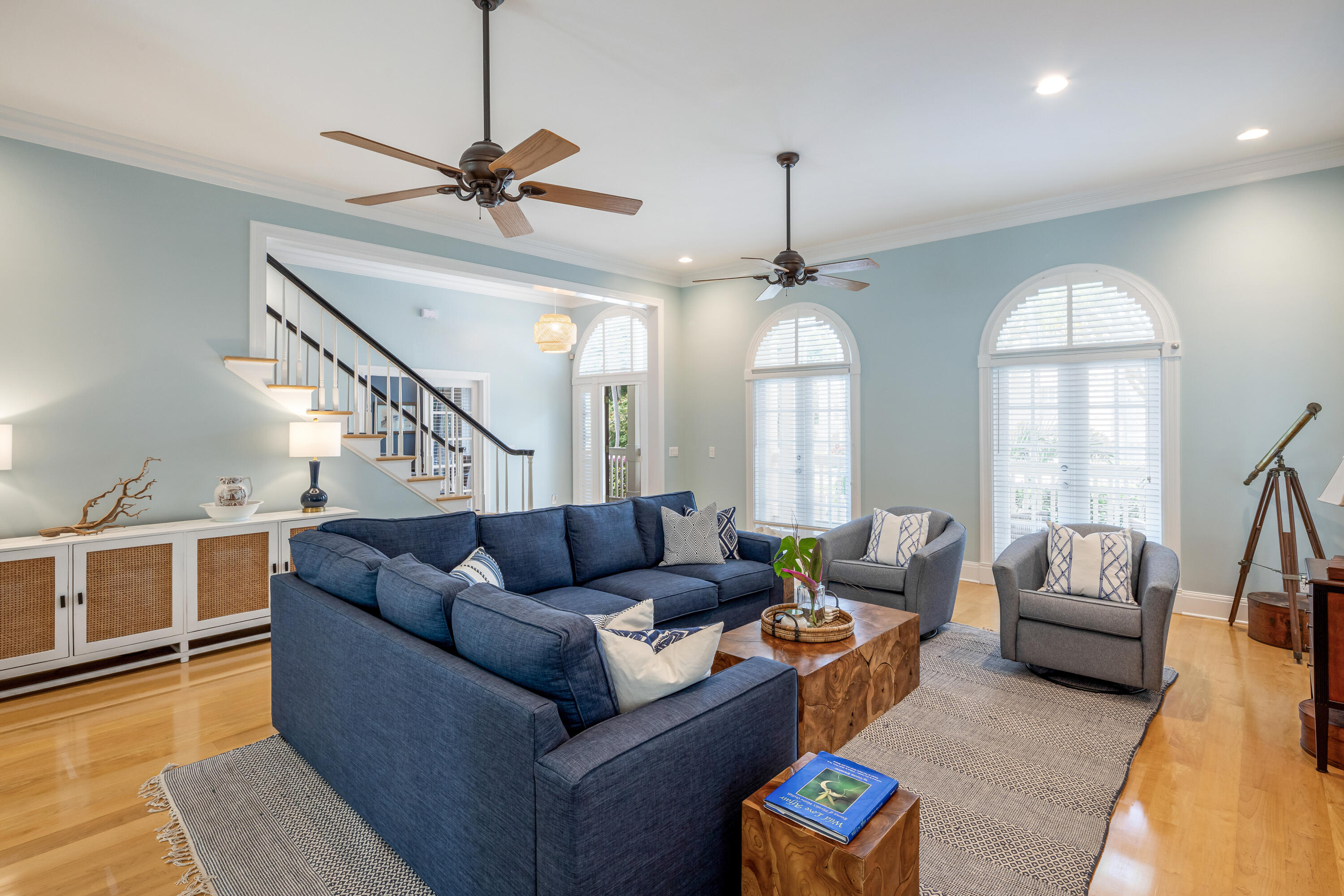64 Front Street Key West, FL 33040 - Photo 9 of 57 a living room with furniture and a chandelier