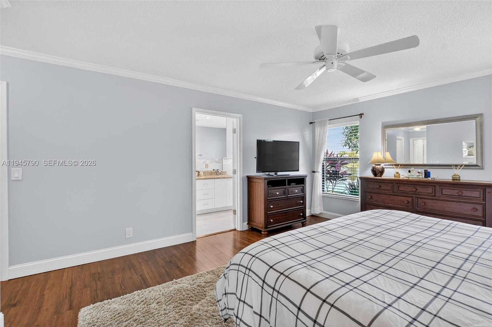 9943 Majorca Place Boca Raton, FL 33434 - Photo 29 of 48 a kitchen with a refrigerator and a stove top oven