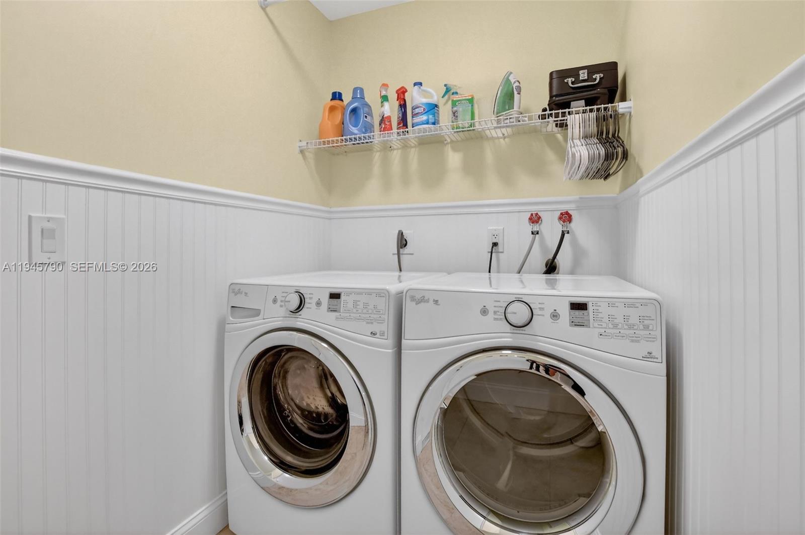9943 Majorca Place Boca Raton, FL 33434 - Photo 41 of 48 a utility room with dryer and washer