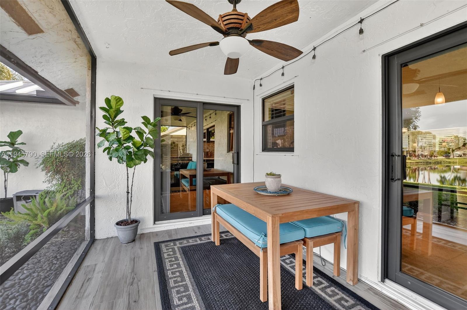 9943 Majorca Place Boca Raton, FL 33434 - Photo 44 of 48 a dining room with table and chairs