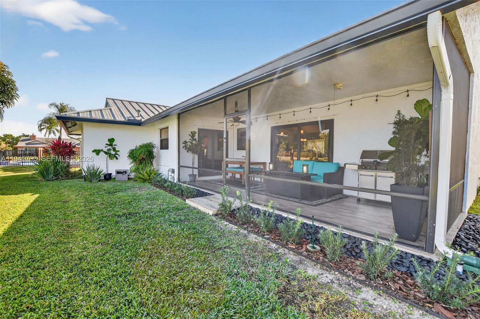 9943 Majorca Place Boca Raton, FL 33434 - Photo 46 of 48 a front view of a house with garden