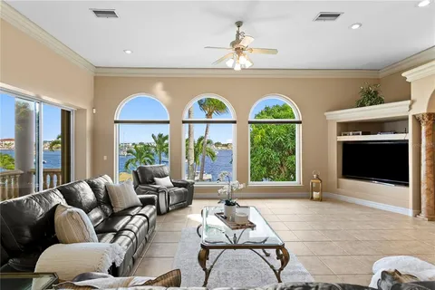 a kitchen with a sink cabinets and window