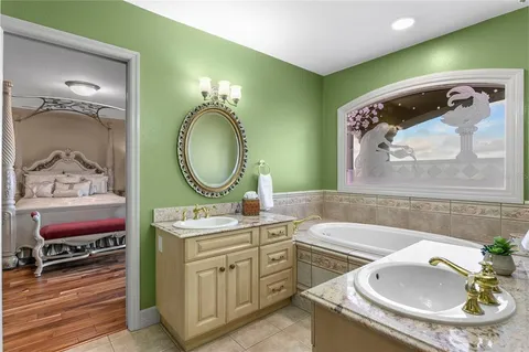 a bathroom with a shower and a sink