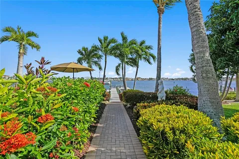 a view of lake from deck with outdoor seating