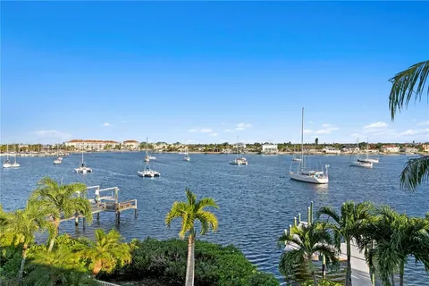 a view of a lake with a yard