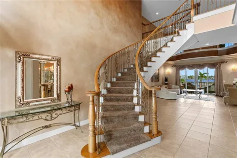 a view of entryway and hall with dining room