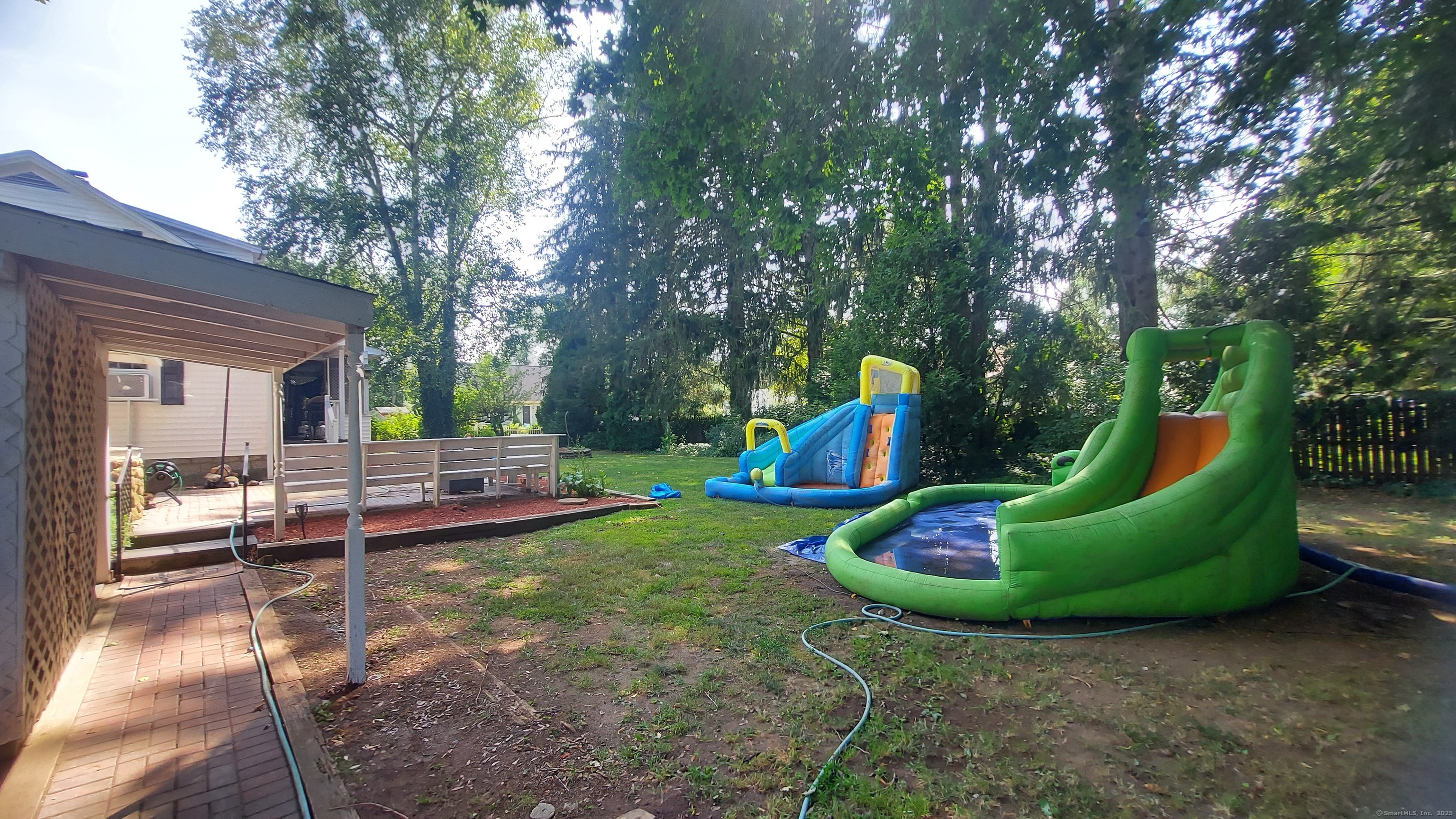26 Perkins Street Plainfield, CT 06374 - Photo 3 of 24 a view of a backyard with swimming pool