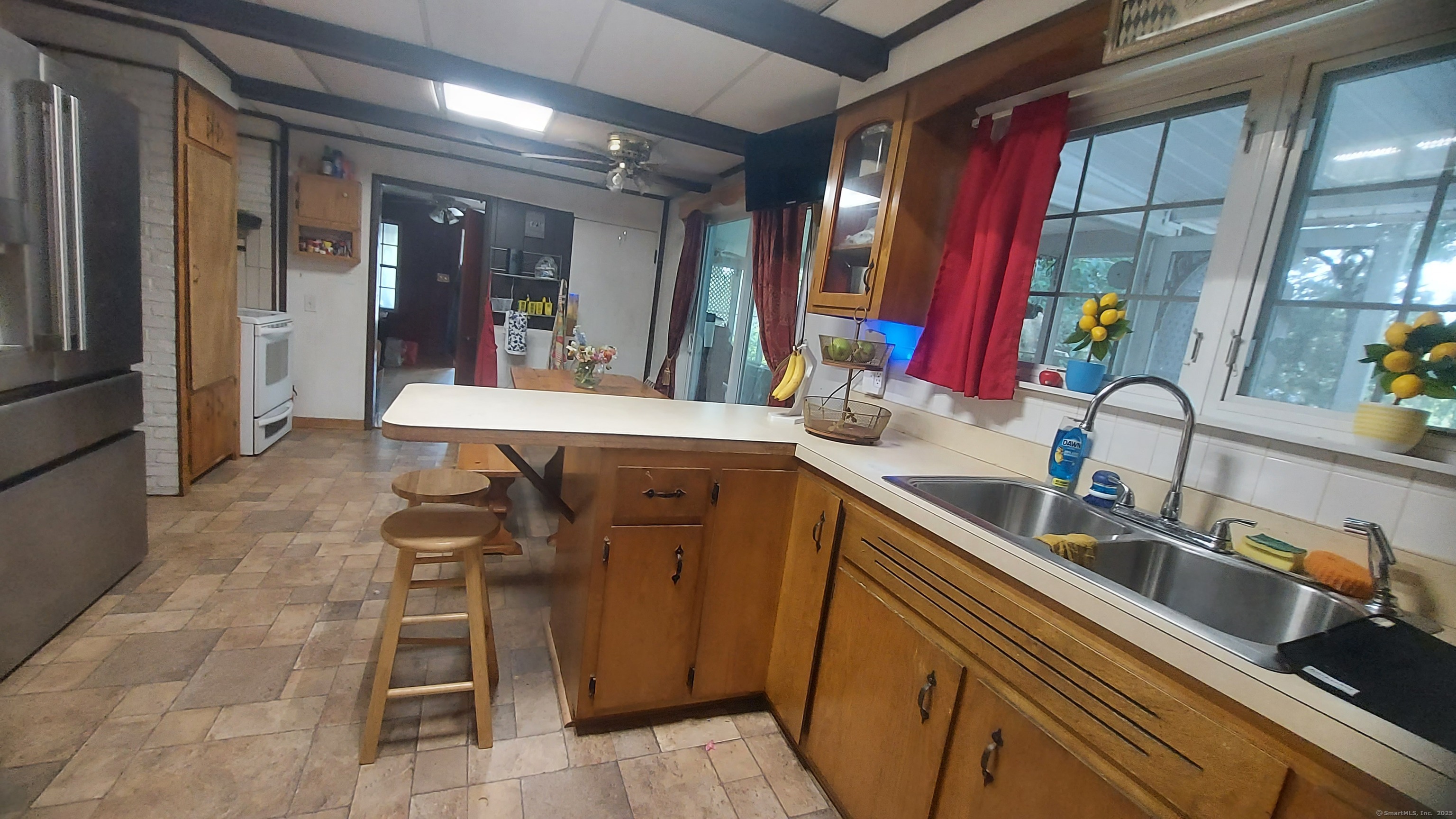 26 Perkins Street Plainfield, CT 06374 - Photo 10 of 24 a bathroom with a sink and a mirror