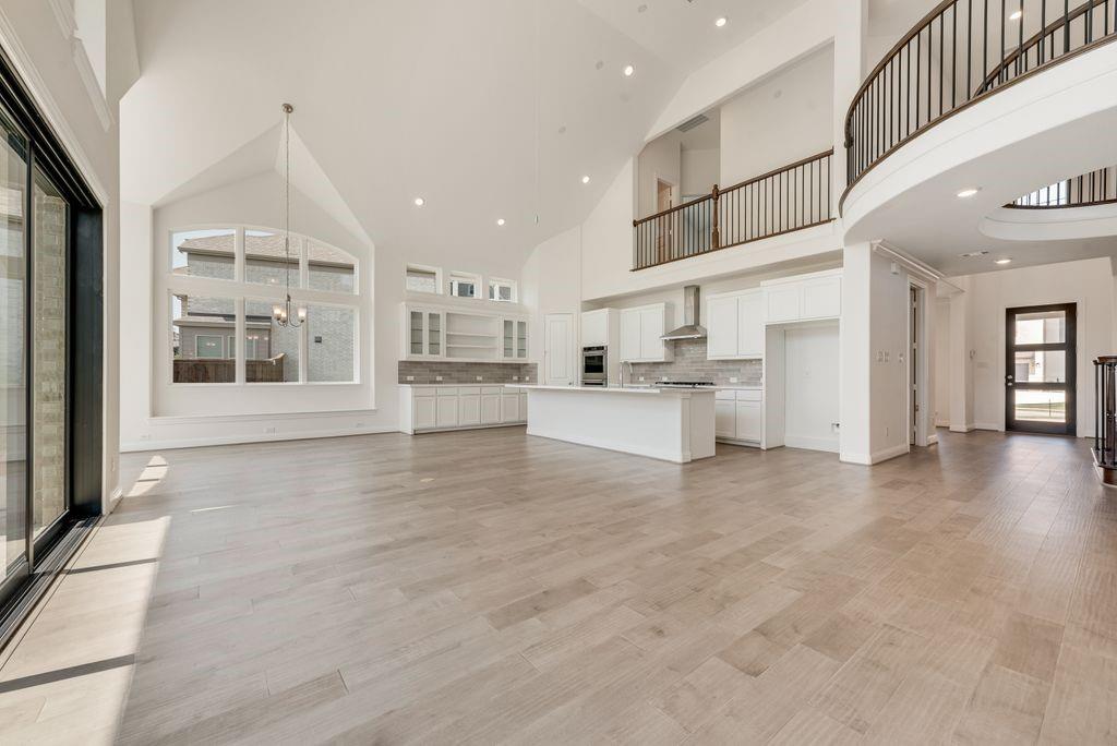 2807 Augustus Way Mansfield, TX 76063 - Photo 15 of 40 a view of a kitchen with stainless steel appliances refrigerator stove microwave and cabinets