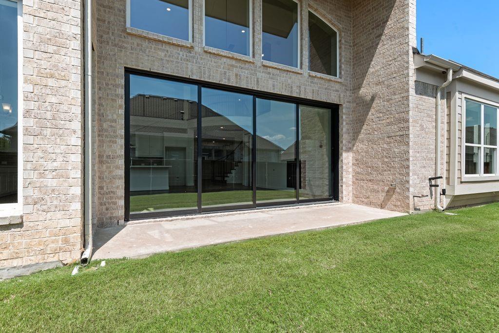 2807 Augustus Way Mansfield, TX 76063 - Photo 35 of 40 a view of yellow house with a large window