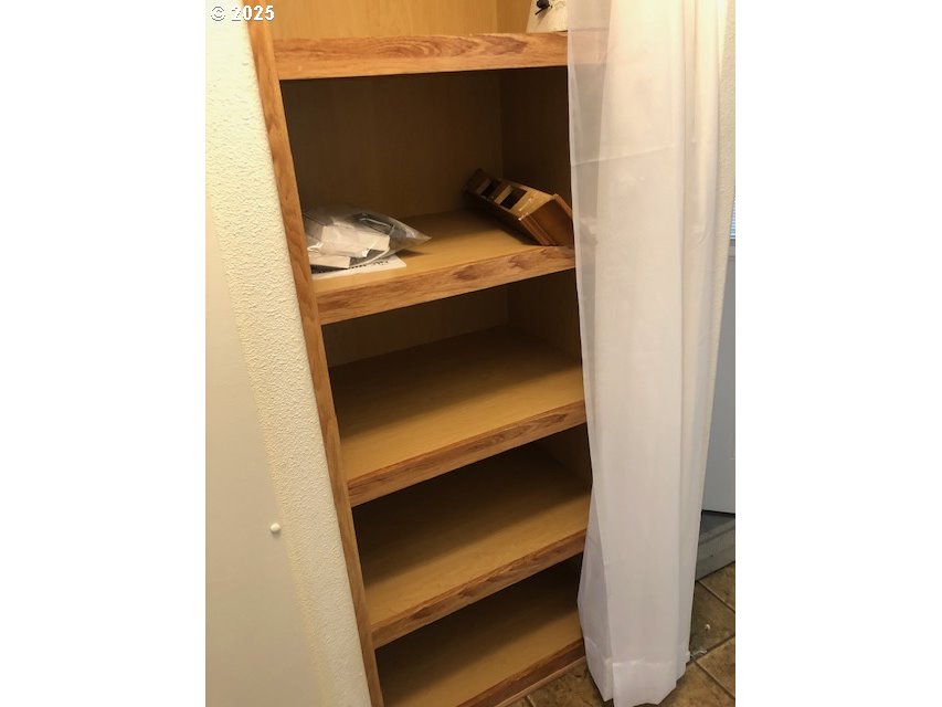 1475 Green Acres Road, Unit 76 Eugene, OR 97408 - Photo 17 of 23 a room with storage and utility