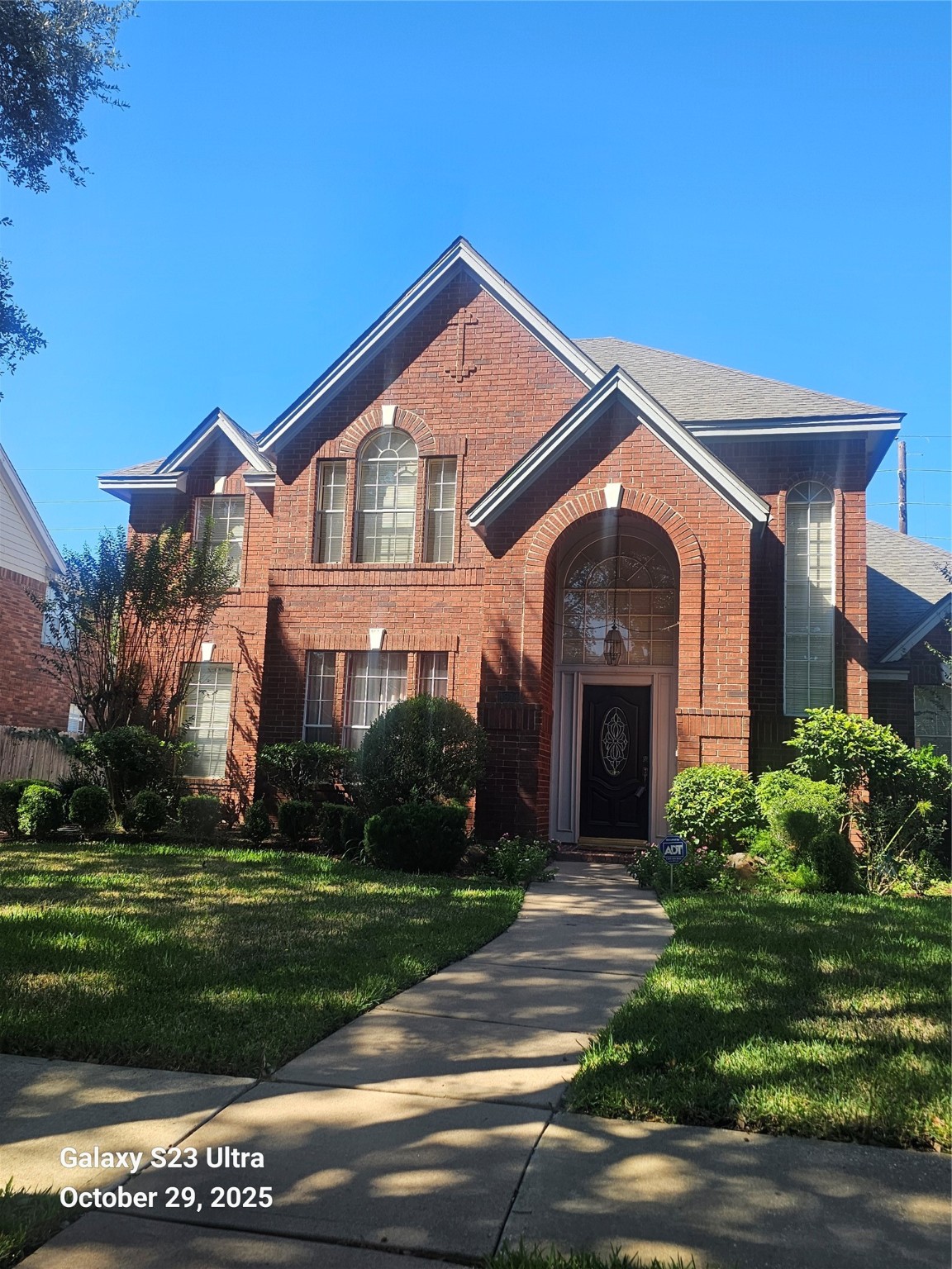 4914 Plantation Colony Drive Sugar Land, TX 77478 - Photo 3 of 16 a front view of a house with a yard