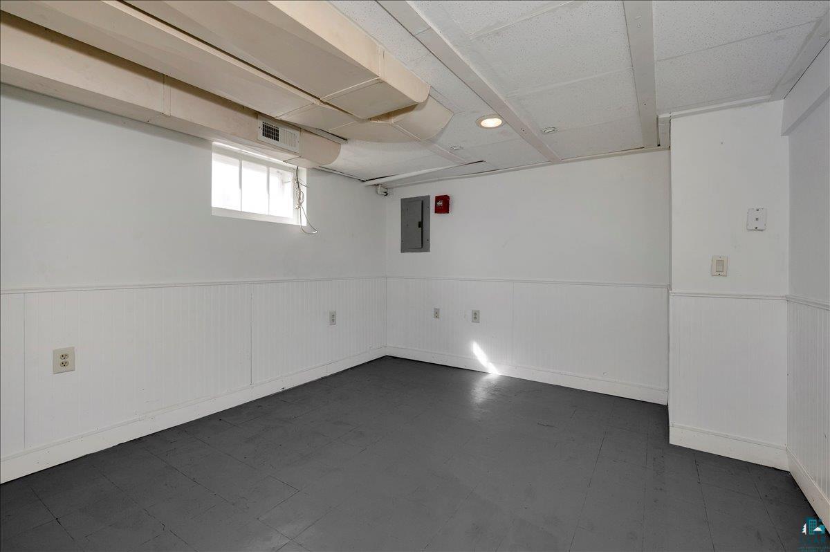 4345 West 8th Street Duluth, MN 55807 - Photo 27 of 31 Unfurnished room featuring dark floors and electric panel