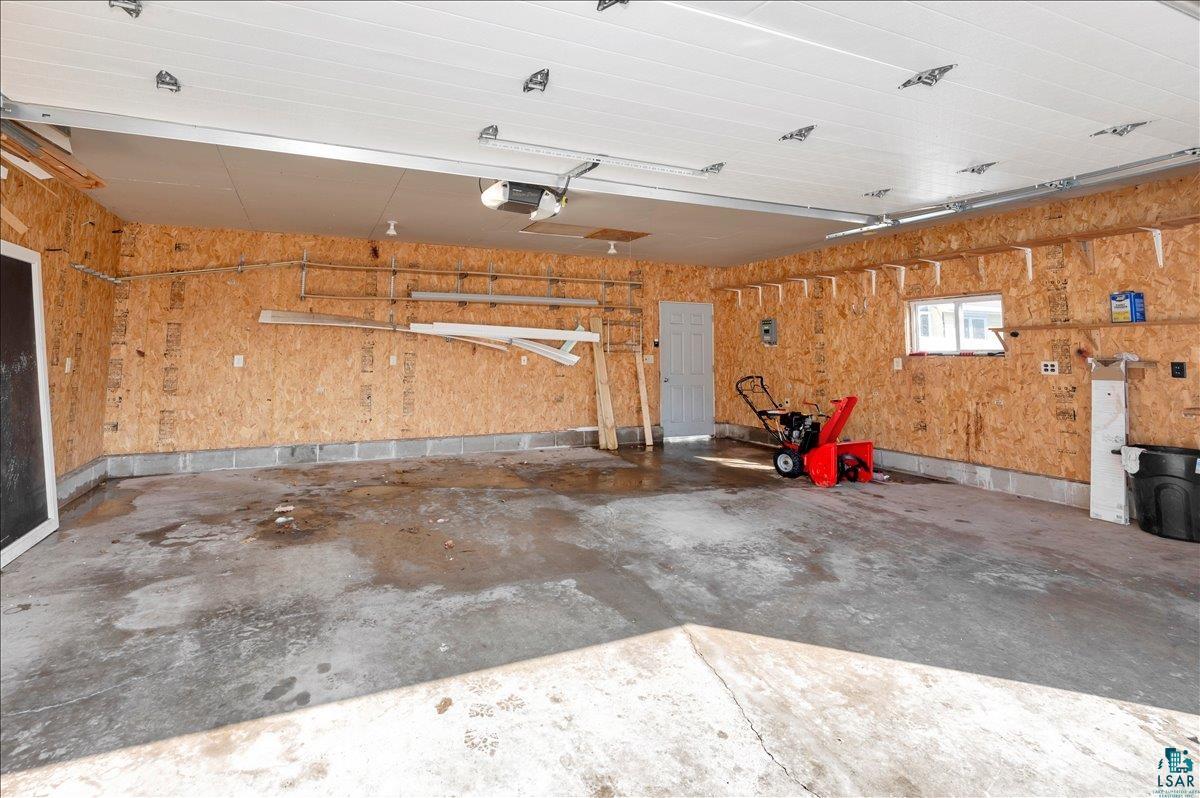 4345 West 8th Street Duluth, MN 55807 - Photo 30 of 31 Garage with a garage door opener
