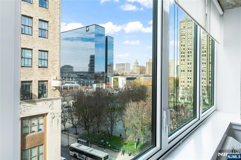 10 Commerce Court, Unit 2E Newark, NJ 07102 - Photo 13 of 17 a view of a balcony with a floor to ceiling windows