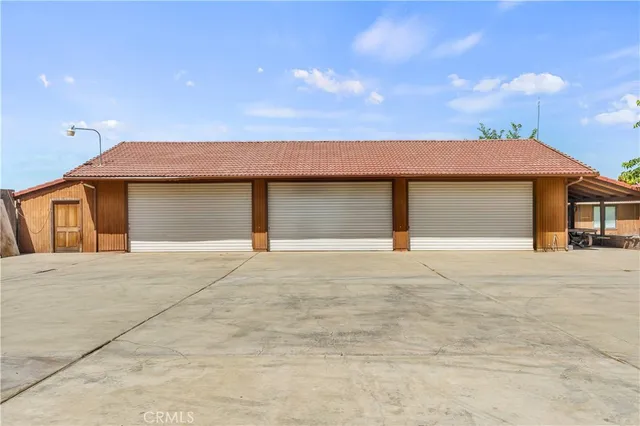 a front view of a house with a garage