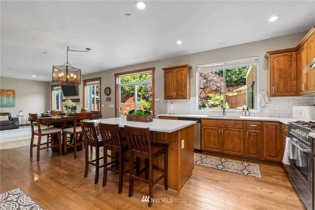 3113 223rd Street Southeast Bothell, WA 98021 - Photo 11 of 40 a view of a dining room with furniture window and outside view