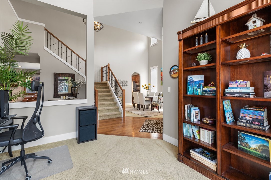 3113 223rd Street Southeast Bothell, WA 98021 - Photo 21 of 40 a view of living room with furniture and book shelf