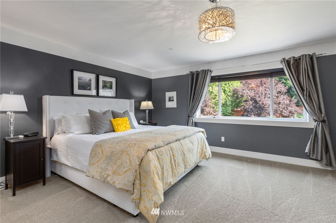 3113 223rd Street Southeast Bothell, WA 98021 - Photo 24 of 40 a bedroom with a bed and a window