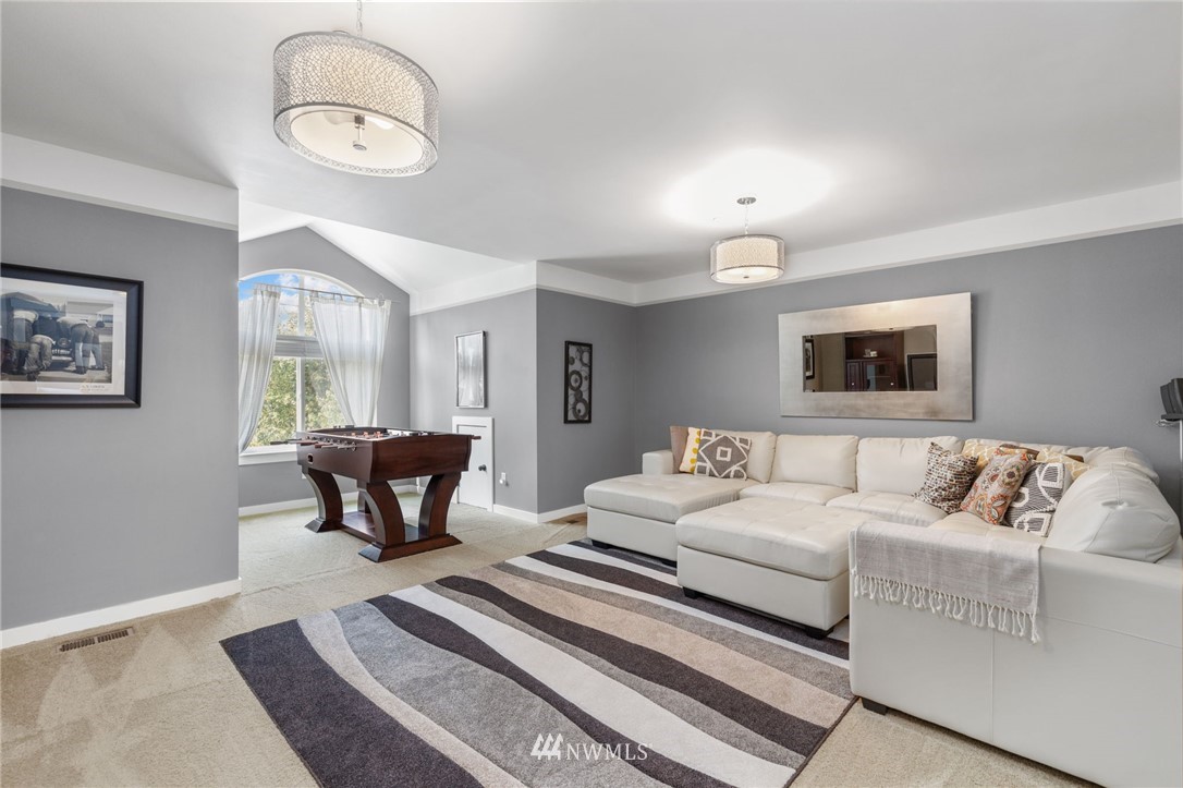 3113 223rd Street Southeast Bothell, WA 98021 - Photo 35 of 40 a living room with furniture