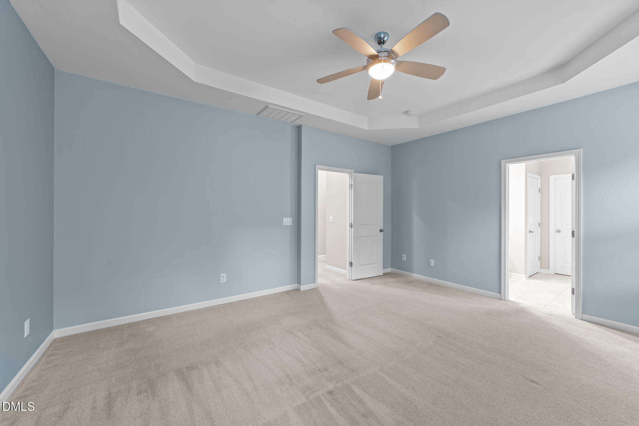26 Mint Julip Circle Clayton, NC 27527 - Photo 23 of 46 a view of an empty room with a ceiling fan
