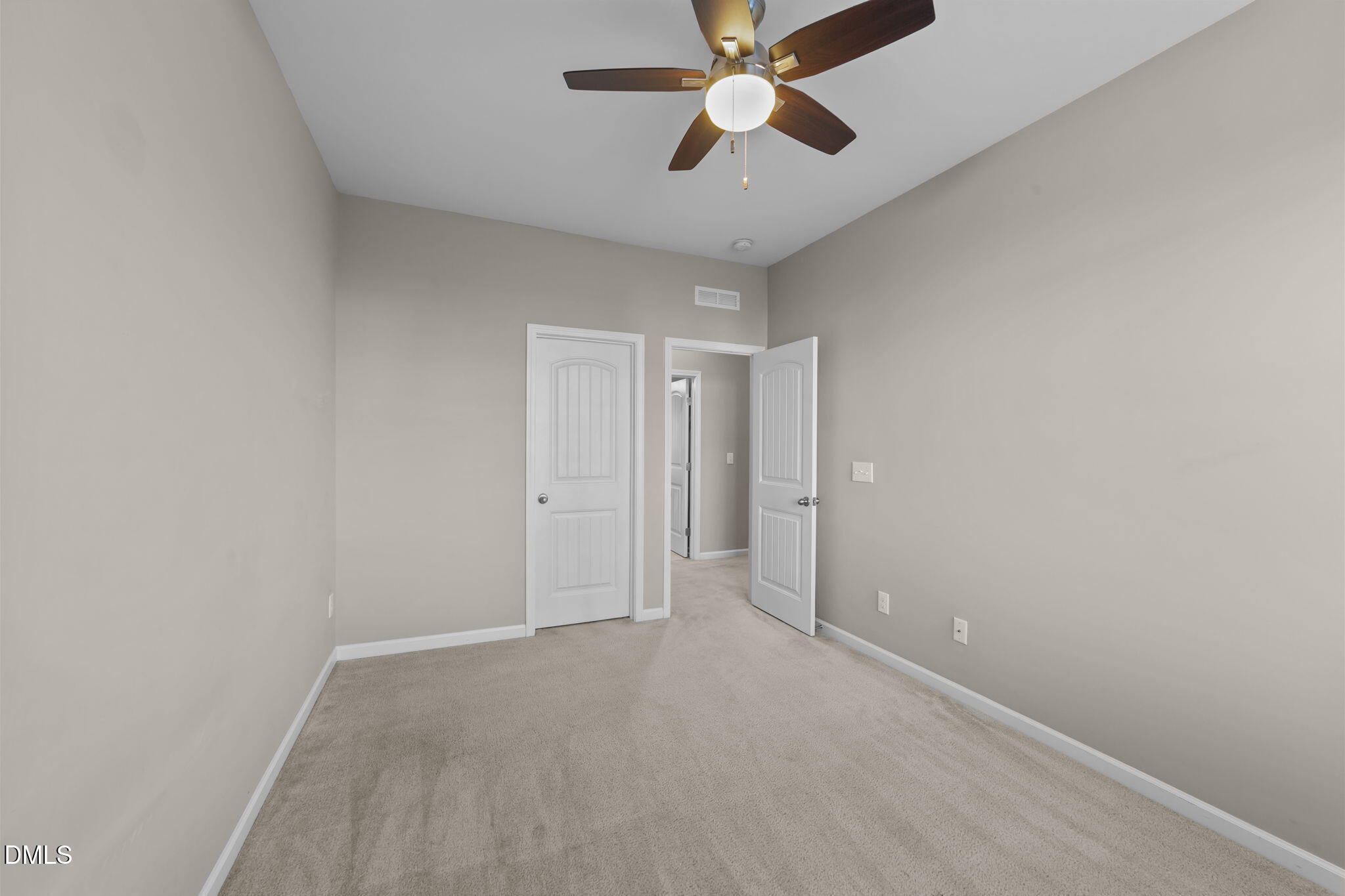 26 Mint Julip Circle Clayton, NC 27527 - Photo 34 of 46 an empty room with a empty space and a ceiling fan