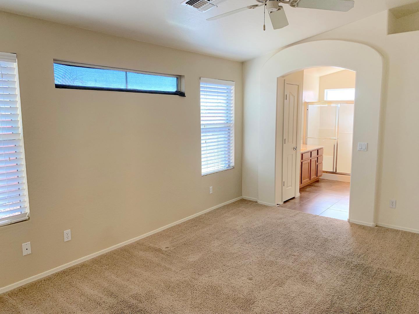 4132 East Chambers Street Phoenix, AZ 85040 - Photo 11 of 28 a view of an empty room with a window