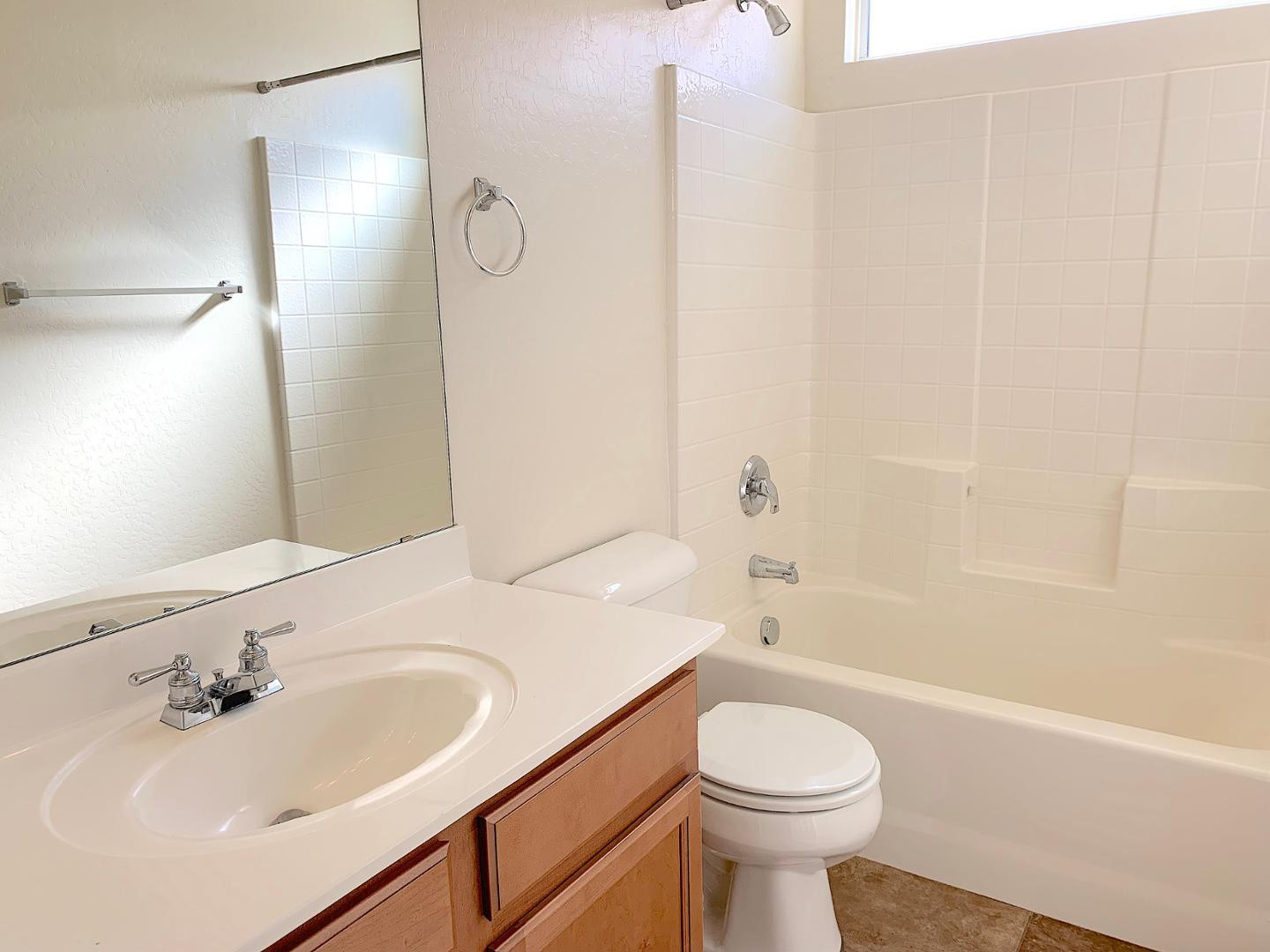 4132 East Chambers Street Phoenix, AZ 85040 - Photo 17 of 28 a bathroom with a sink toilet and shower