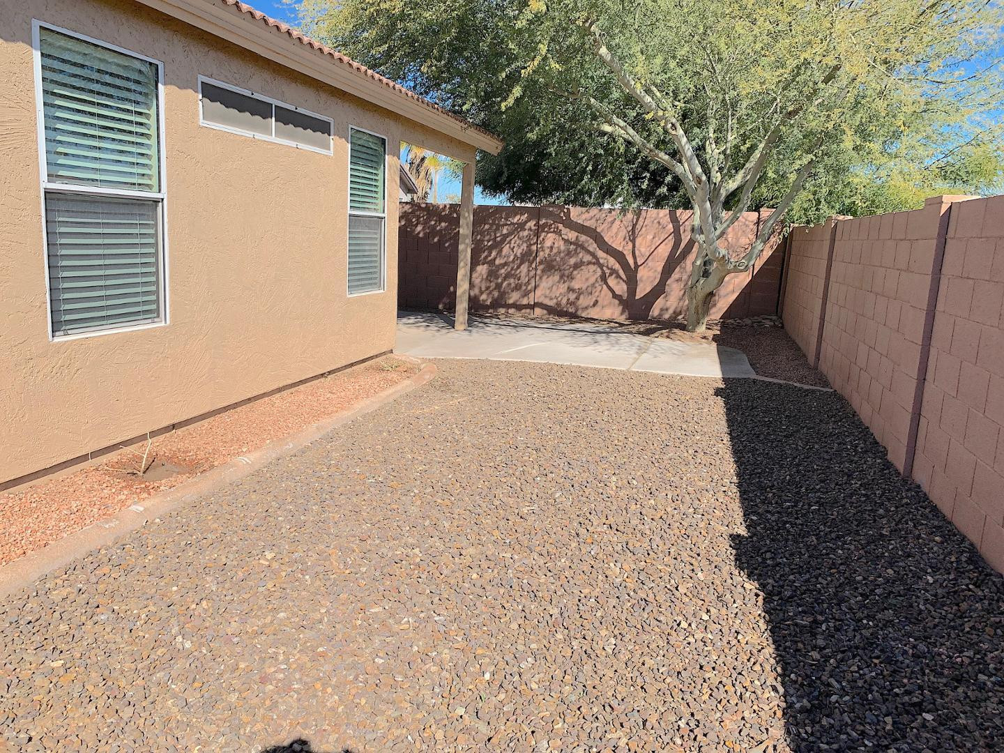 4132 East Chambers Street Phoenix, AZ 85040 - Photo 25 of 28 a view of a backyard with wooden fence