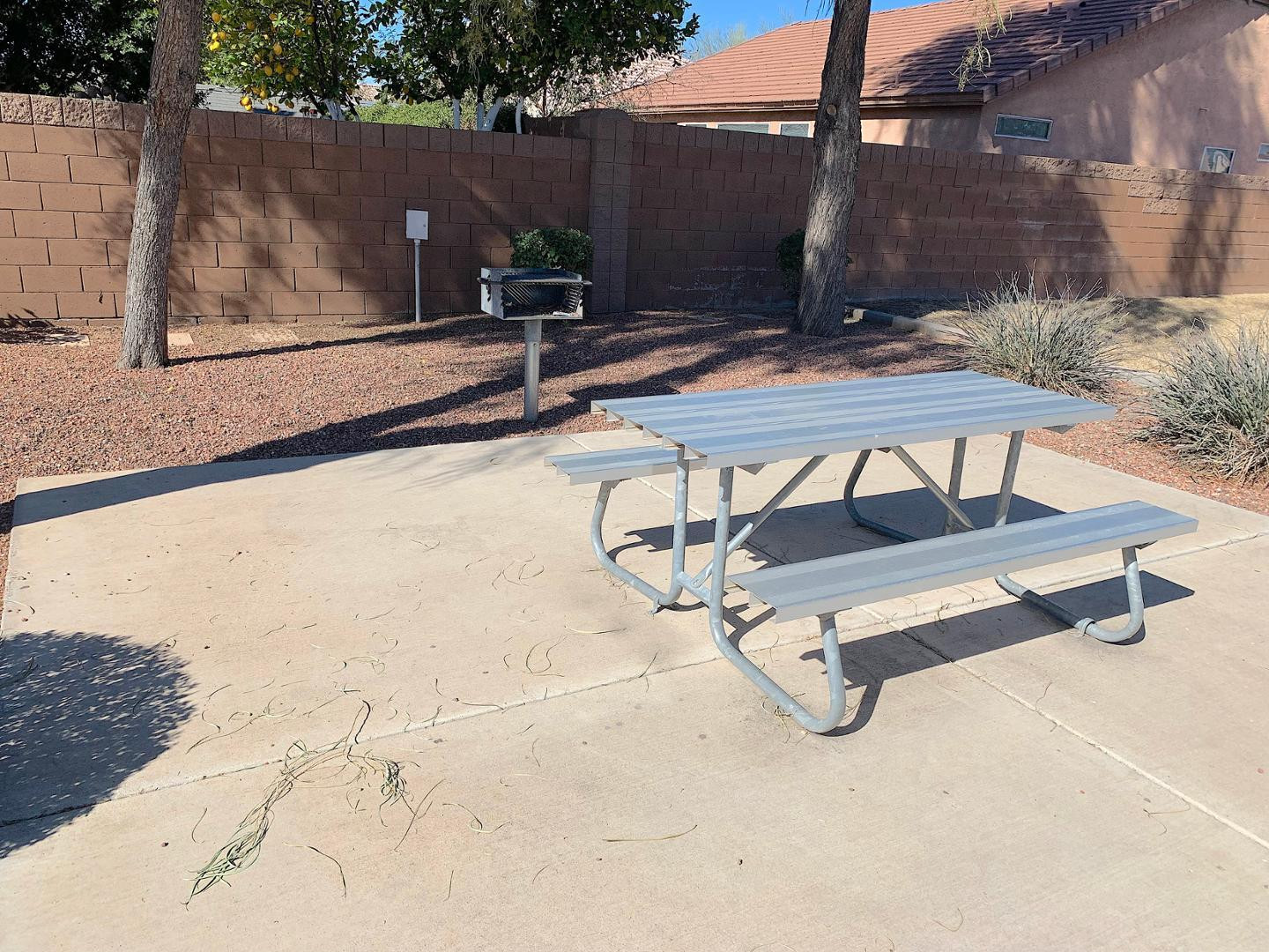 4132 East Chambers Street Phoenix, AZ 85040 - Photo 26 of 28 a view of backyard with a table and chairs