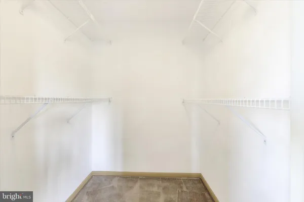 a bathroom with a sink a mirror and vanity