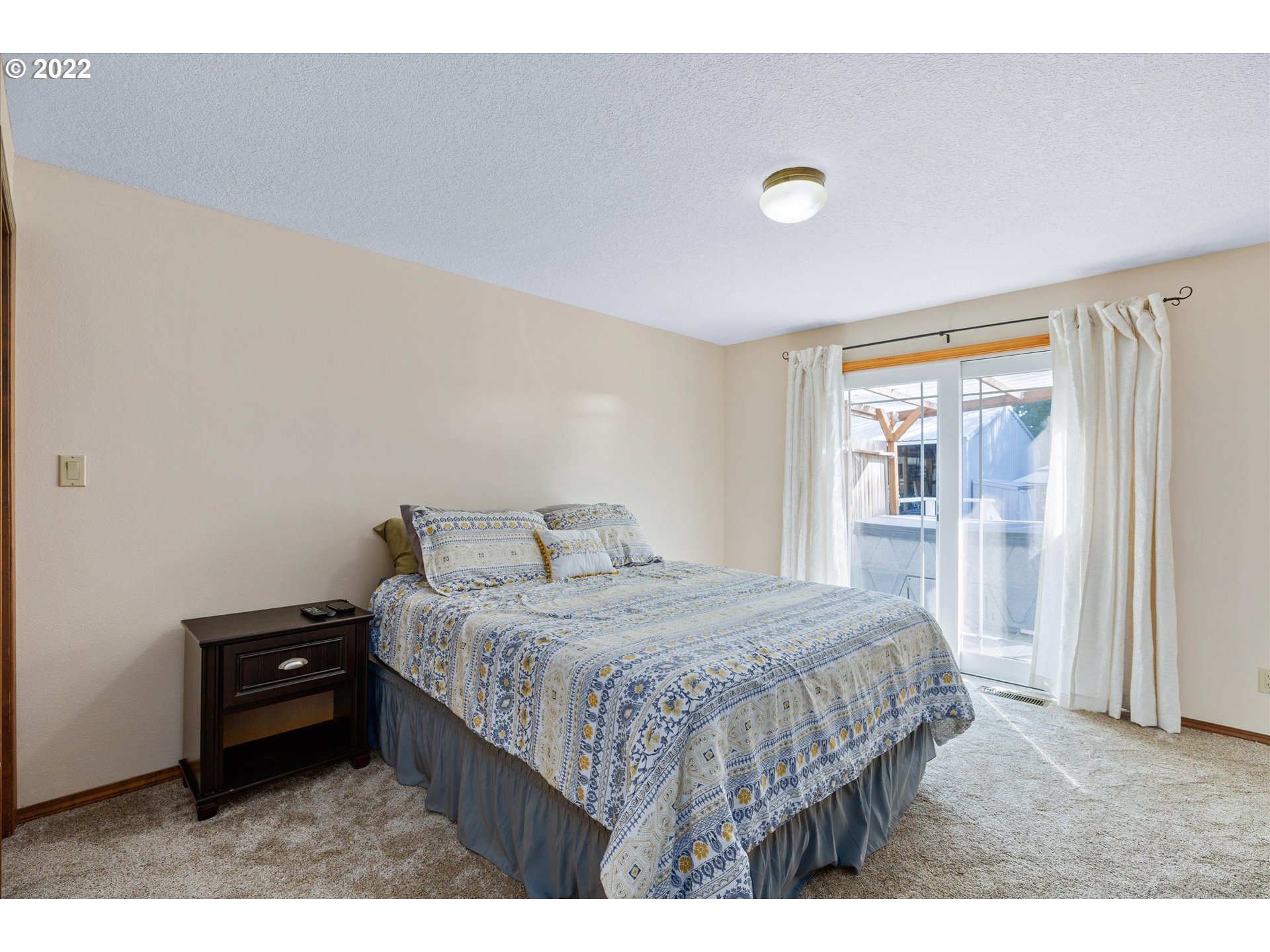 16178 South Henrici Road Oregon City, OR 97045 - Photo 17 of 27 a bedroom with a bed and a window