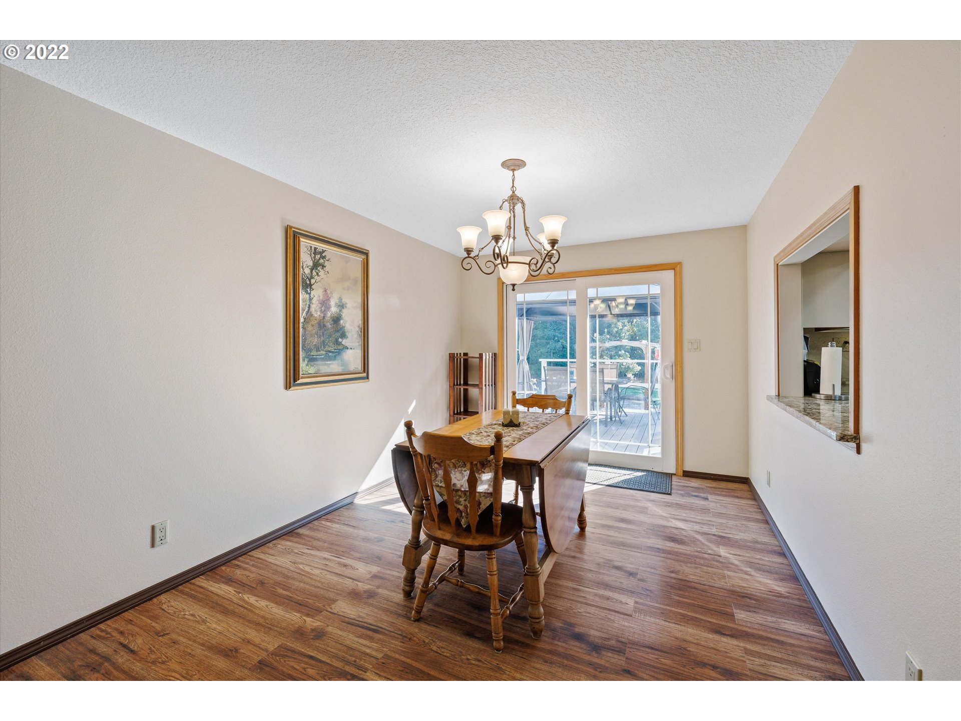 16178 South Henrici Road Oregon City, OR 97045 - Photo 8 of 27 a view of a dining room with furniture and window