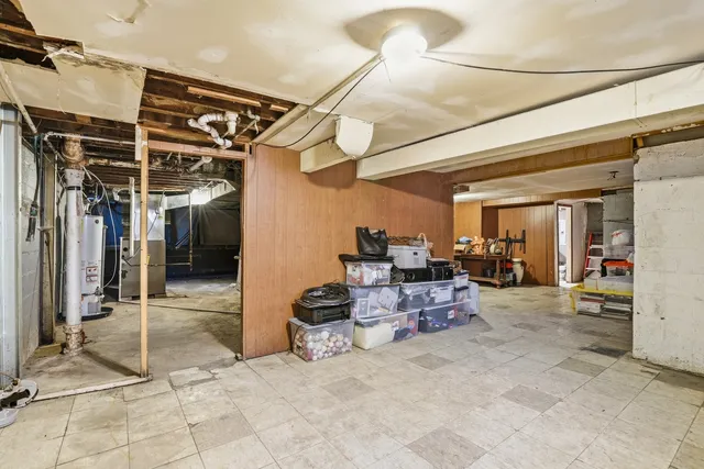 a view of a hallway with seating area