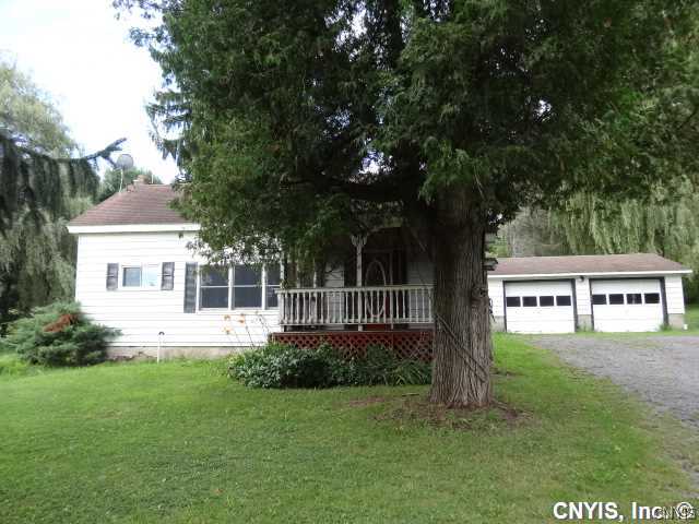 4191 Augusta Road Madison, NY 13402 - Photo 1 of 1 Exterior Front Sweet screened in porch hugs front
