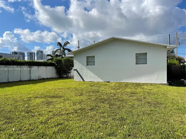 a view of outdoor space and yard