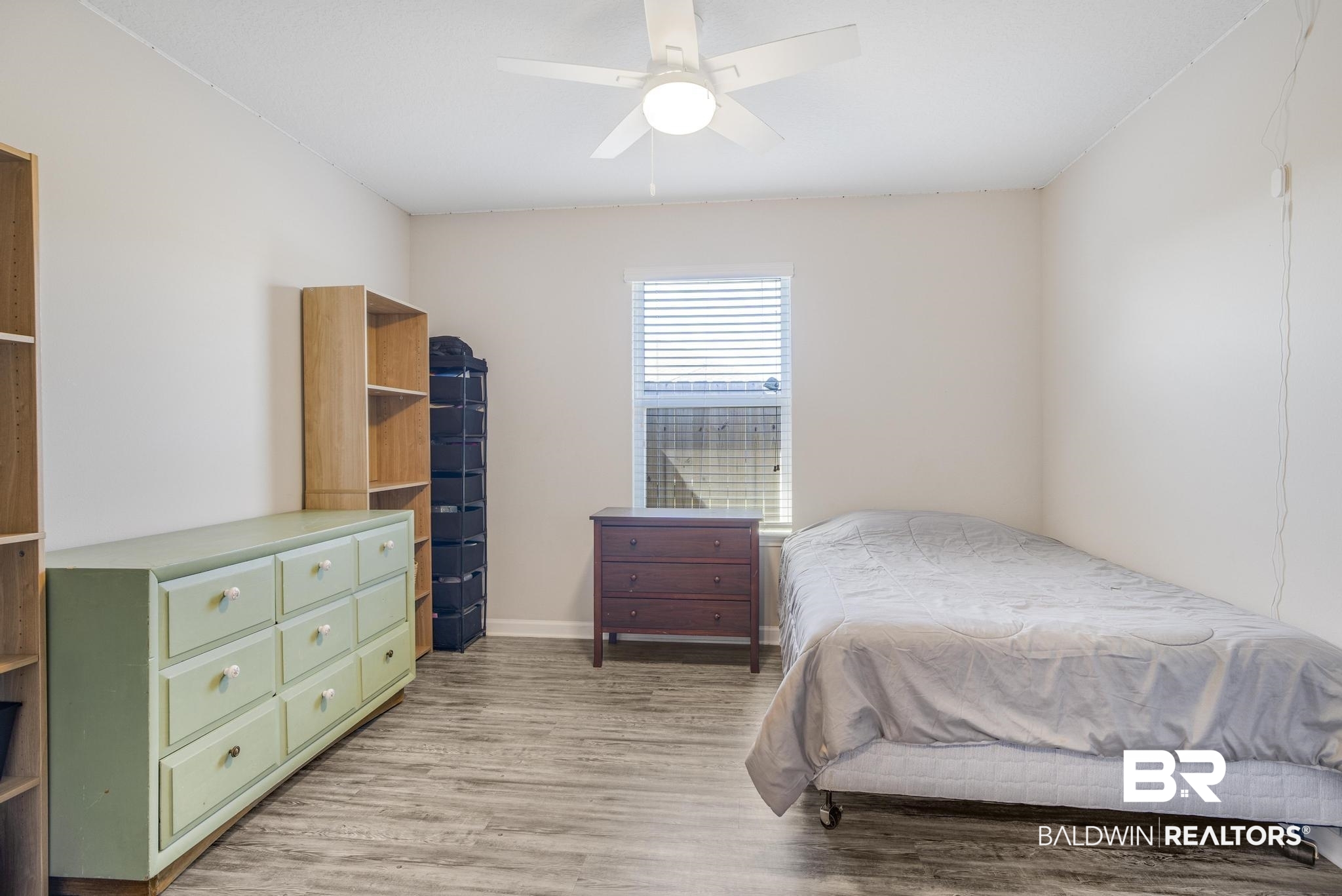 10738 Ridgeview Drive Mobile, AL 36608 - Photo 21 of 48 Bedroom with light wood-style floors and a ceiling fan