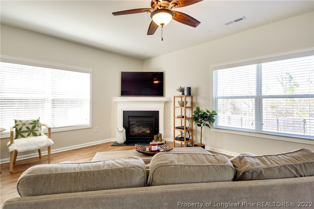 381 River Oaks St Spring Lake Spring Lake, NC 28390 - Photo 20 of 49 a spacious bedroom with a bed and a flat screen tv