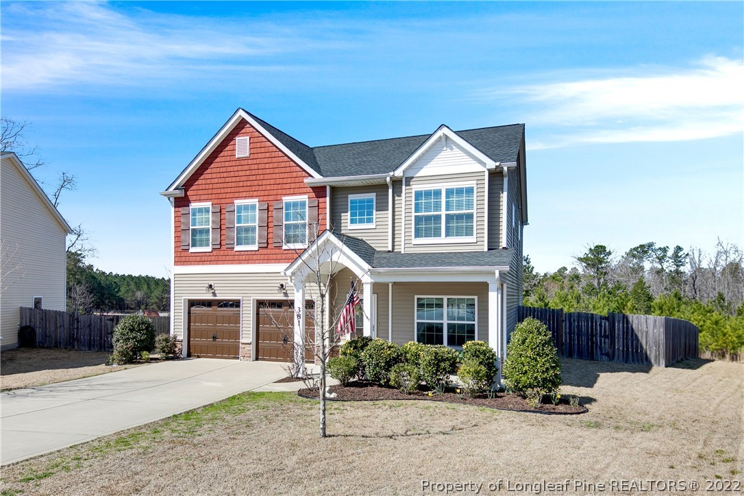 381 River Oaks St Spring Lake Spring Lake, NC 28390 - Photo 2 of 49 a front view of a house with a yard