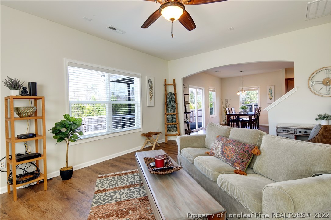 381 River Oaks St Spring Lake Spring Lake, NC 28390 - Photo 22 of 49 a living room with furniture and a large window
