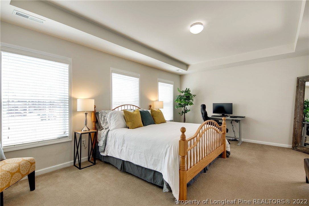 381 River Oaks St Spring Lake Spring Lake, NC 28390 - Photo 26 of 49 a bedroom with a bed and a window