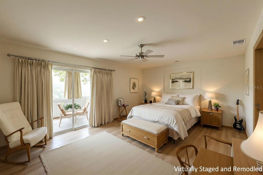 3757 Countryside Road Sarasota, FL 34233 - Photo 12 of 34 a spacious bedroom with a bed and glass walk in closet