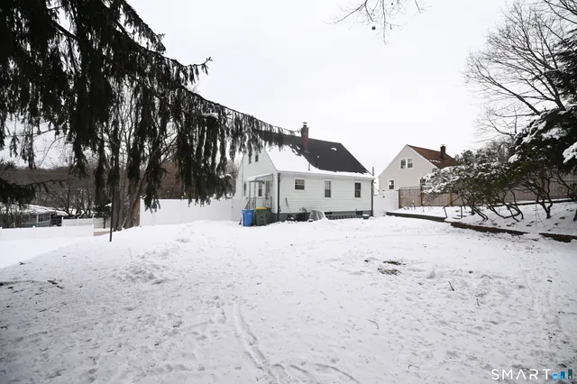 a view of snow on the road