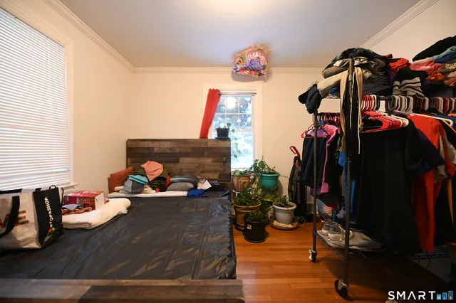 a view of a livingroom with furniture gym equipment