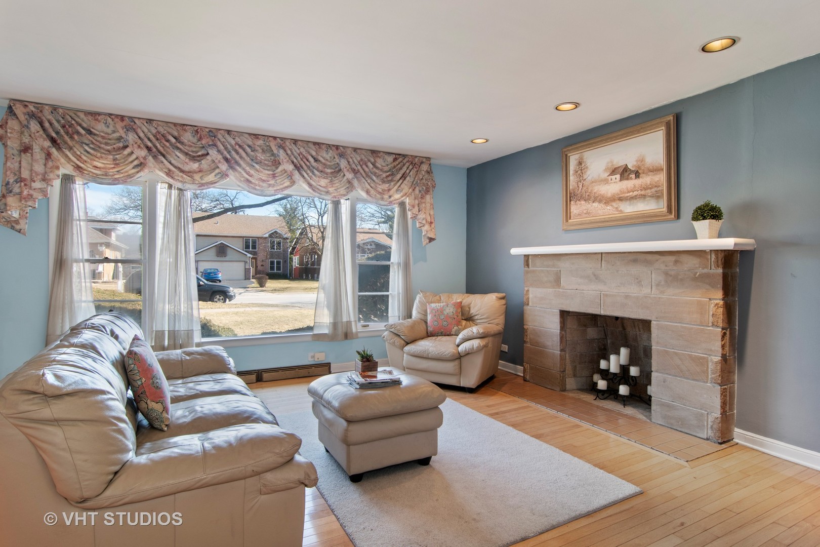 430 Longcommon Road Riverside, IL 60546 - Photo 2 of 20 a living room with furniture and a fireplace