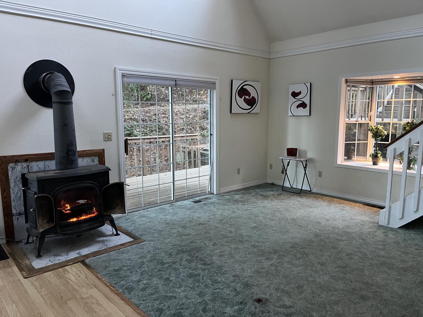 18165 Santa Ana Road Los Gatos, CA 95033 - Photo 7 of 14 a living room with furniture and a fireplace
