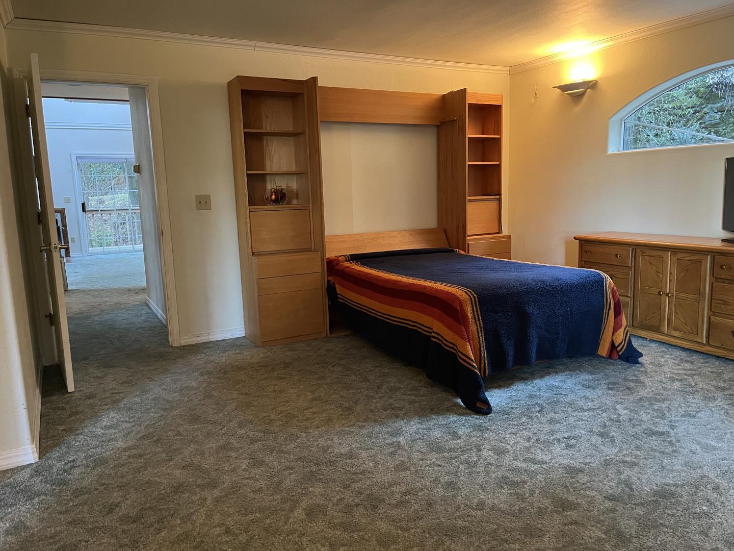 18165 Santa Ana Road Los Gatos, CA 95033 - Photo 9 of 14 a bedroom with a bed and a cabinets