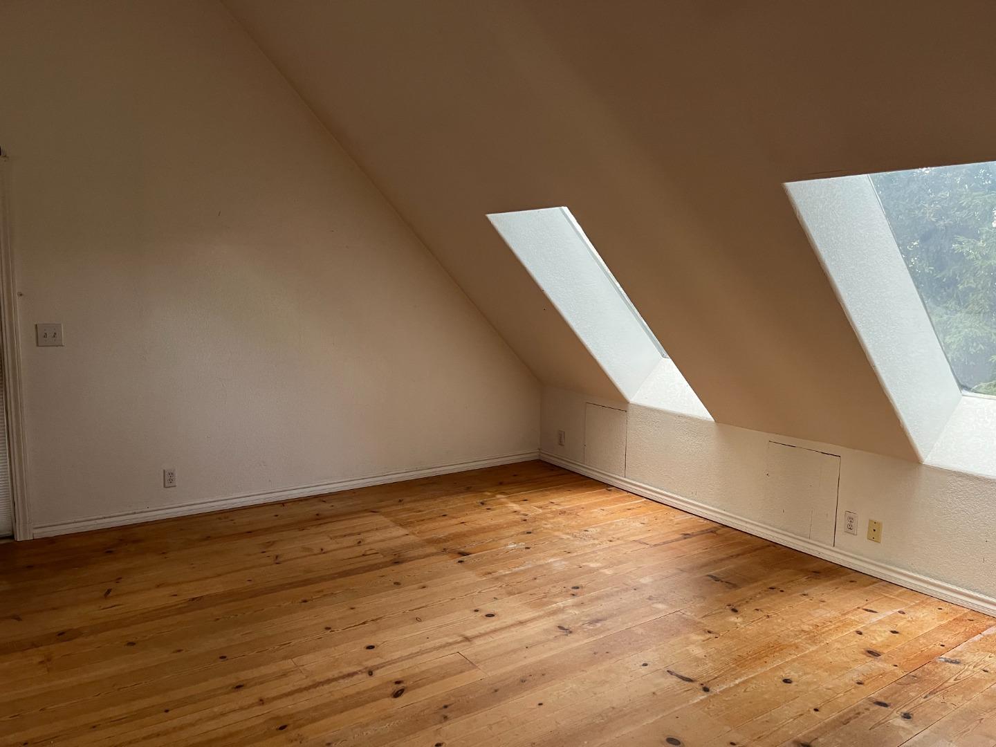 18165 Santa Ana Road Los Gatos, CA 95033 - Photo 10 of 14 a view of an empty room with wooden floor