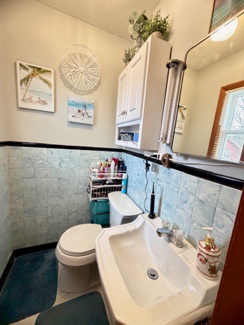 112 Ragan Street Tullahoma, TN 37388 - Photo 11 of 23 a bathroom with a sink mirror and toilet