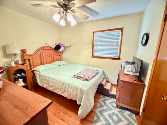 112 Ragan Street Tullahoma, TN 37388 - Photo 13 of 23 a bedroom with a bed and a dresser